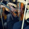 Pictures of people with violins